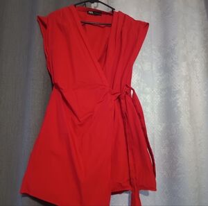Red jumper dress with skorts